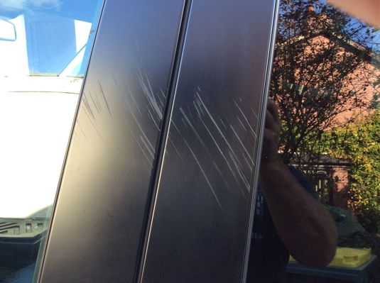 scratches on car after customer trying to get keys out of locked car